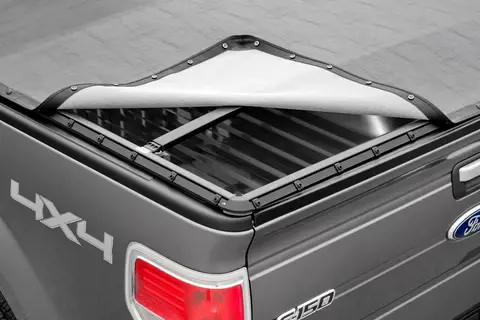 how to unlock truck bed cover 